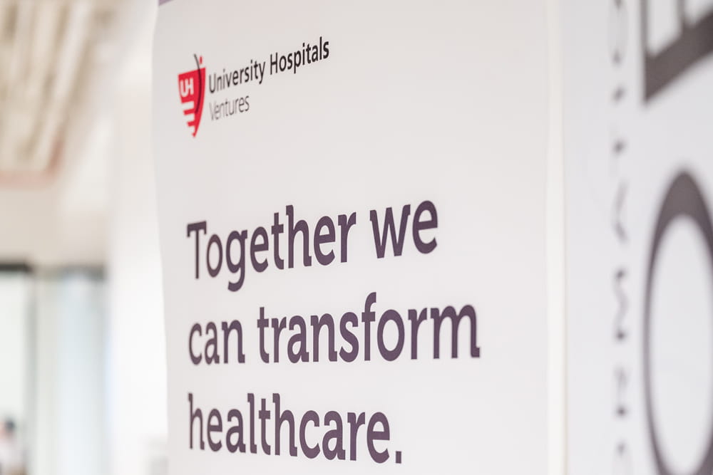 a sign that reads: Together we can transform healthcare